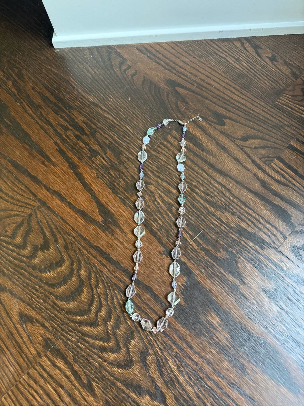 Necklace with faceted clear and pastel-toned crystal beads